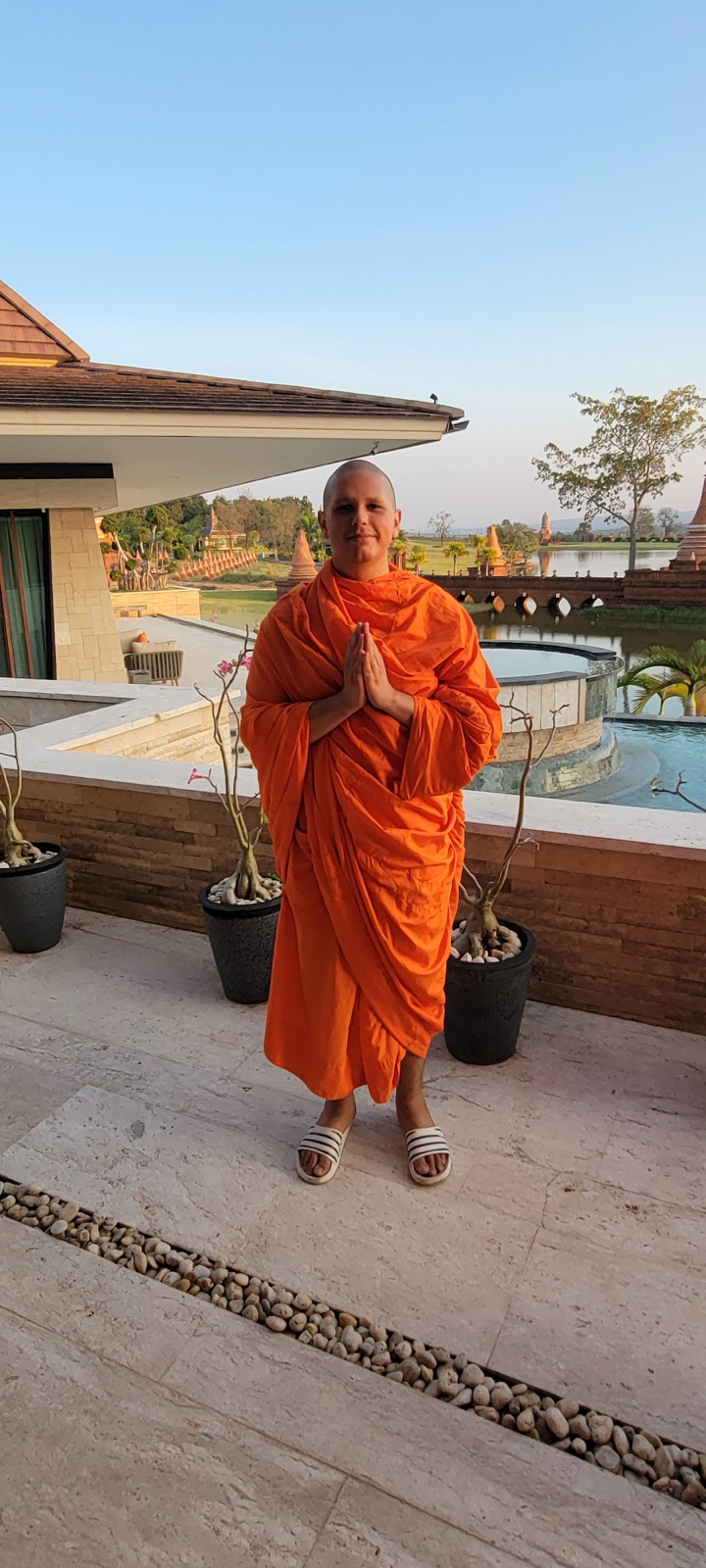 Kevin wearing Buddhist monastic robes in Thailand