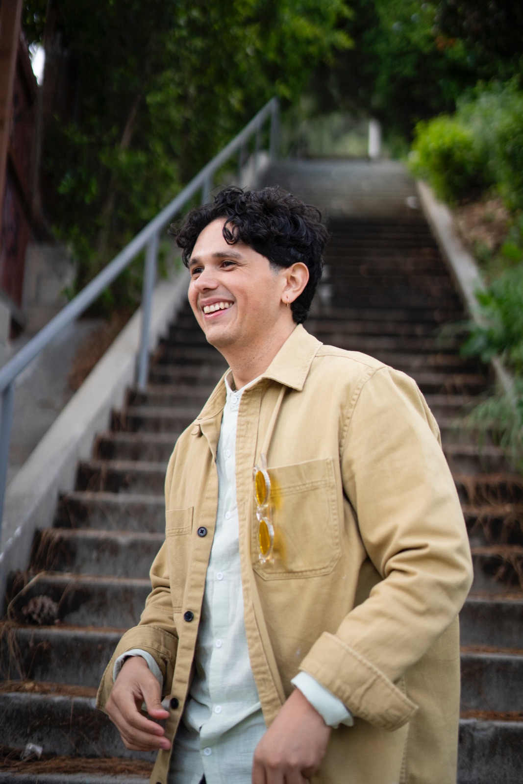 Portrait of Kevin beside an outdoor staircase